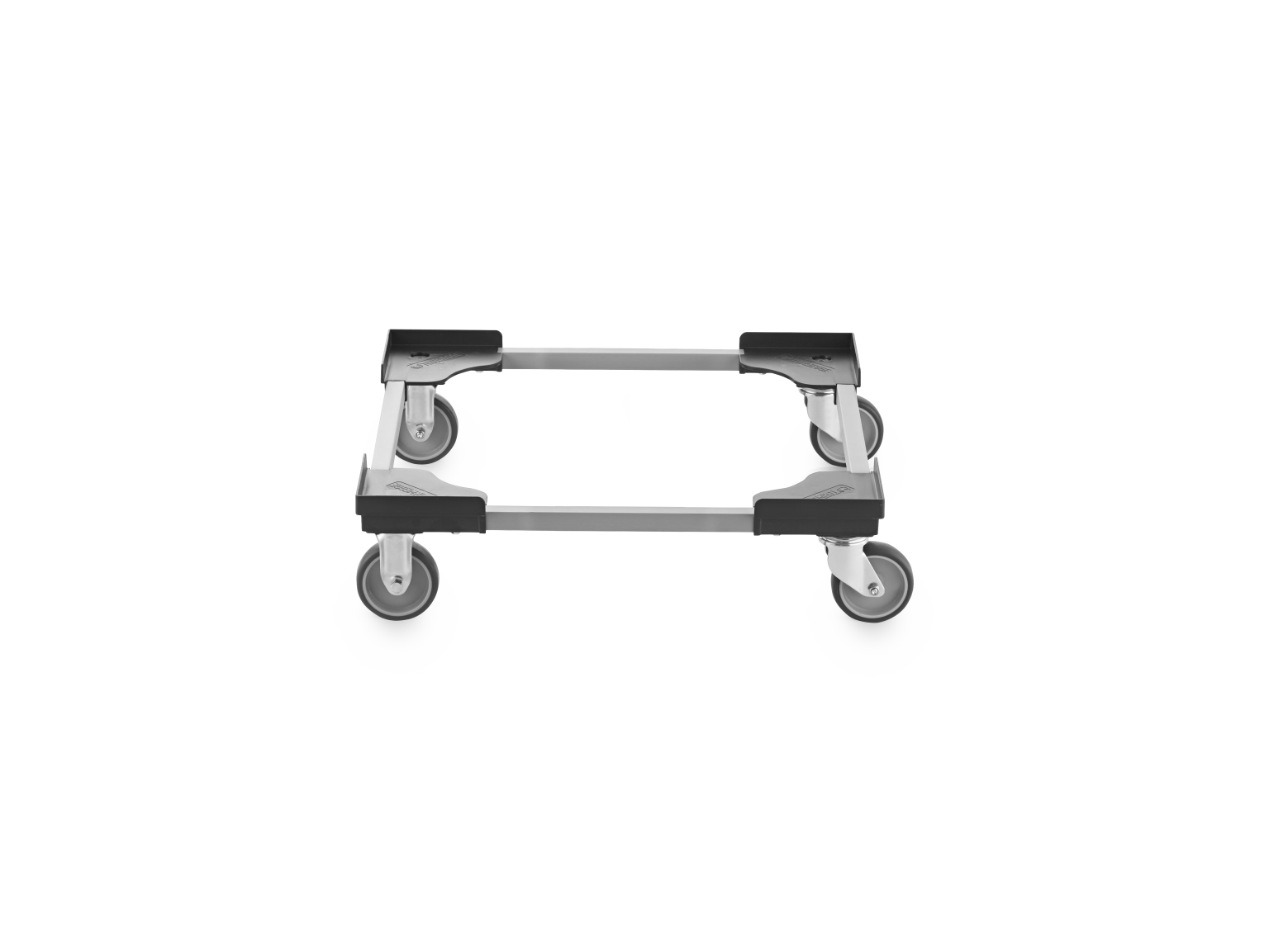 A transport trolley with four swivel castors is positioned horizontally. The sturdy frame is made of metal, featuring plastic mounting plates at the corners, designed for mobility in industrial settings.
