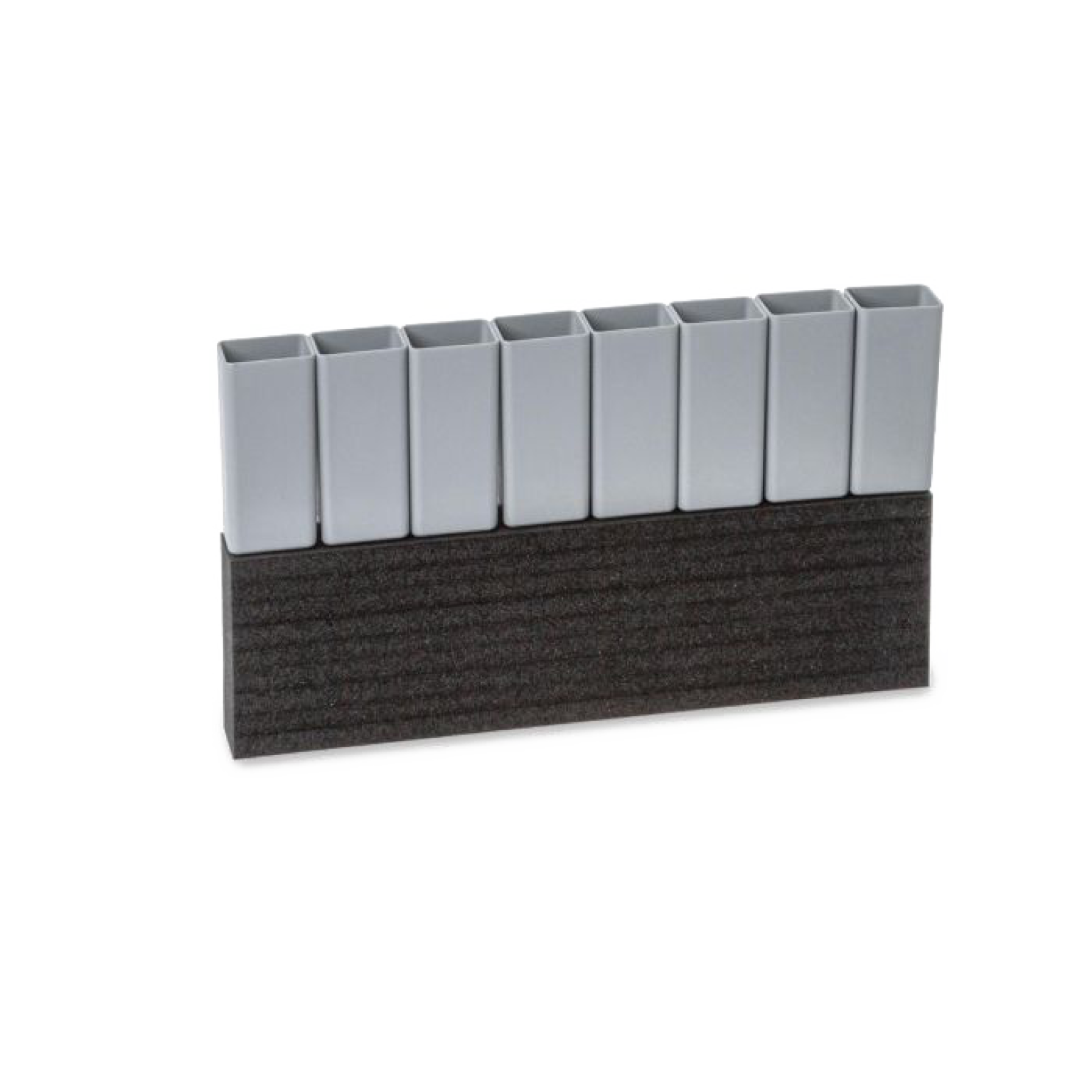 A rectangular component features several vertical gray tubes arranged in a row on a dark textured base. The tubes appear to be made for holding or guiding items, likely in an industrial context.