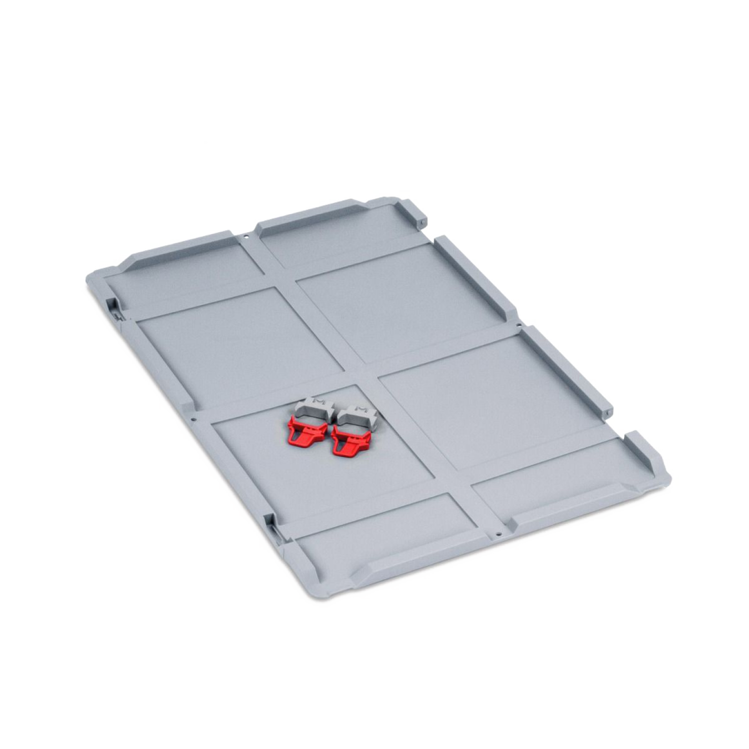 A gray industrial pallet is shown, featuring multiple sections and two red clips attached to its surface. The pallet is flat, offering a stable foundation for transport or storage in a warehouse environment.