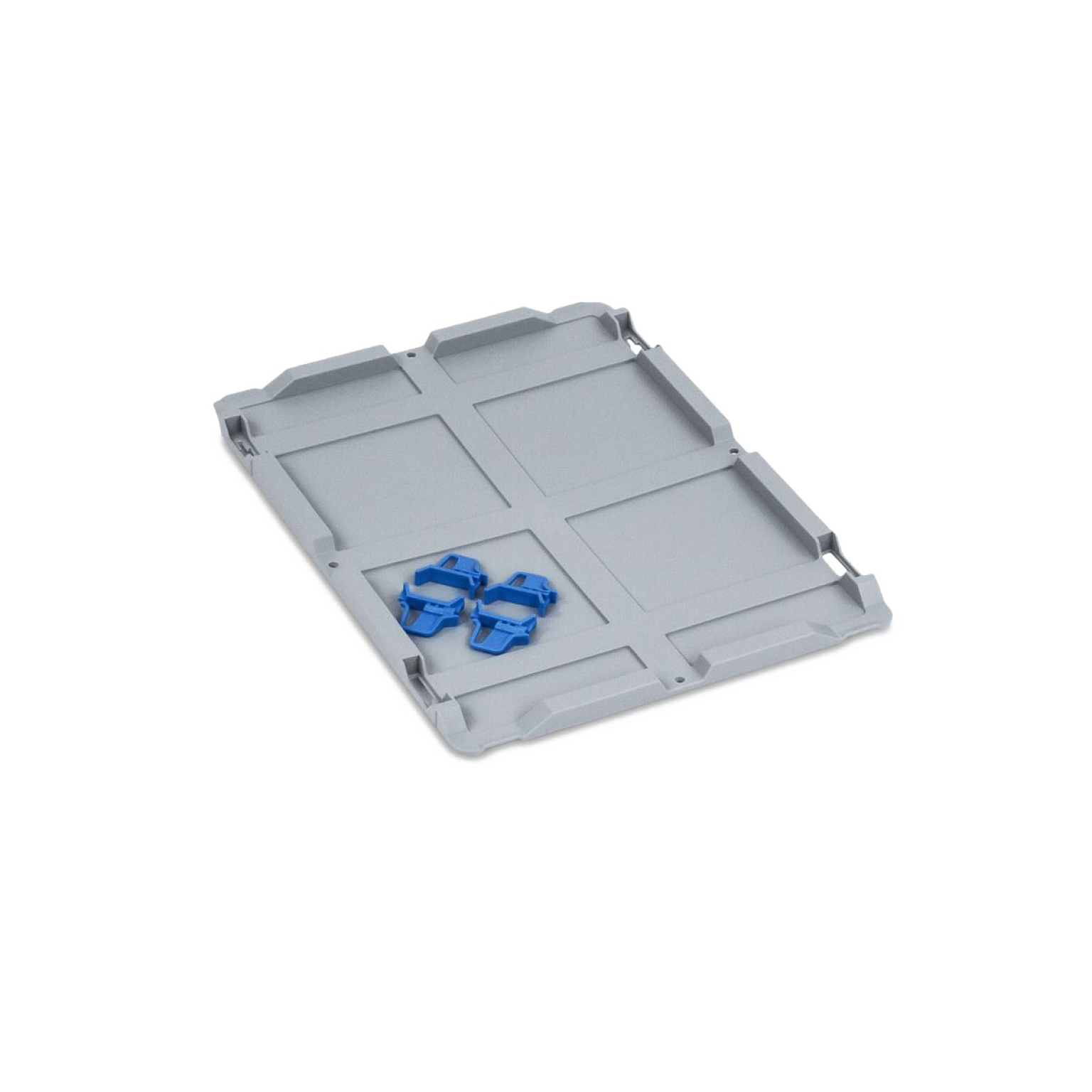 A gray plastic pallet base is positioned flat, featuring molded sections for stability. Two blue plastic clips are placed on top, likely for securing items. The background is plain.