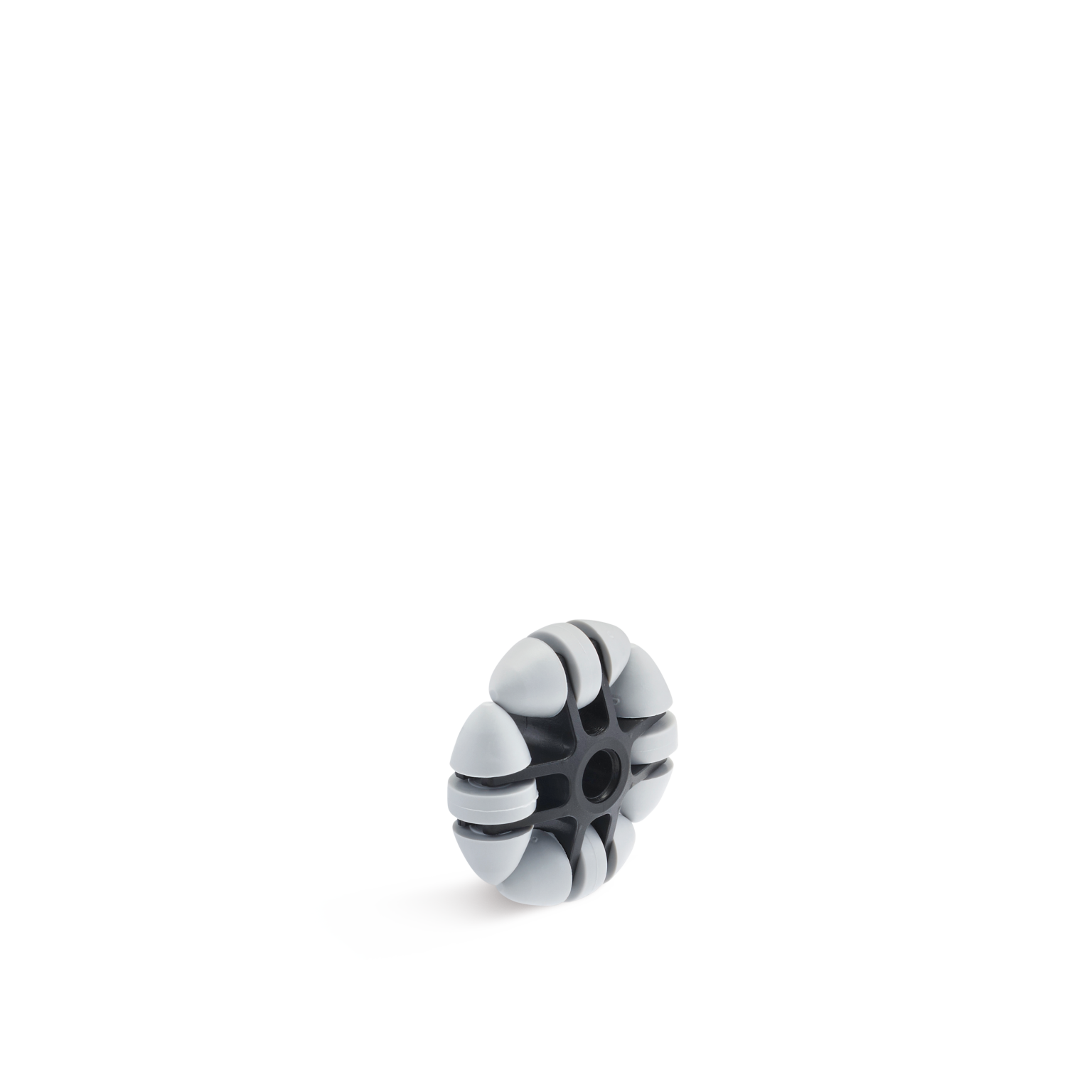 A round, industrial wheel features a black core with gray rubberized segments protruding outward. It is designed for movement, likely used in material handling applications, positioned against a plain background.