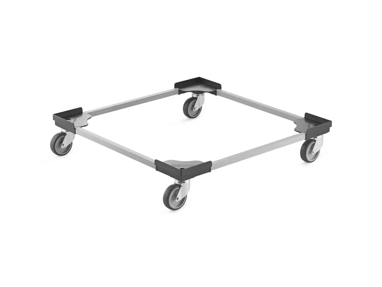 A square transport dolly with four swiveling castors at each corner, made from metal with plastic corners. It is designed for moving heavy items within a warehouse or industrial setting.
