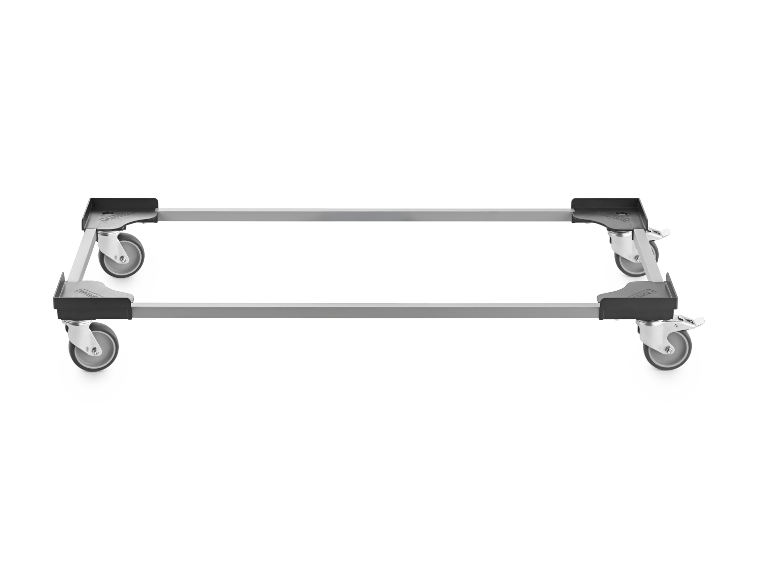A transport trolley features a rectangular metal frame with four swivel castors at each corner. The structure is designed for ease of movement in an industrial setting, with a simple and sturdy design.