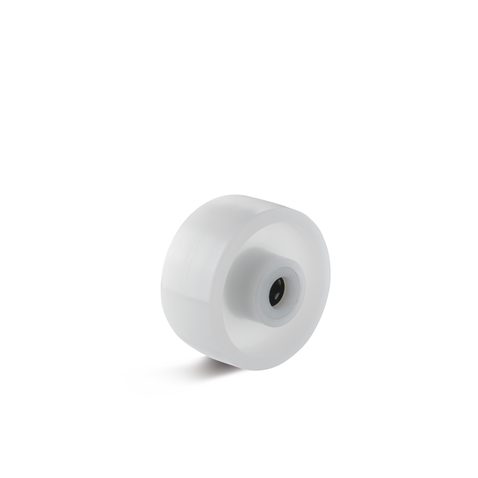 A transparent wheel with a smooth surface rests on a flat white surface. It has a central spindle hole, indicating it-s designed for mounting. The background is minimalistic.